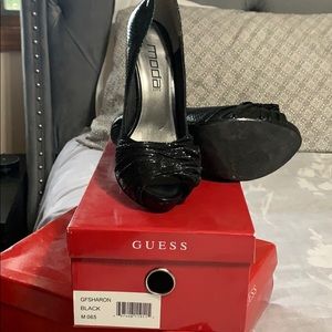 Black platform heels gently used